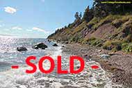 13.5 acre Property with ca 200 m shore front on the open Bras D`Or Lake for sale on Cape Breton Island, Nova Scotia, Canada