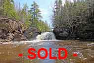 Picturesque Waterfall at 160 acres Woodlot and 1km Riverfront for sale on Cape Breton Island, Nova Scotia, Canada – near Glendale between Port Hawkesbury and Baddeck