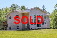 modern home with two separate apartments just a few steps to the Bras d'Or Lake for sale in Valley Mills on Cape Breton, Nova Scotia