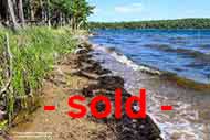 2.4 acr property with waterfront at Bras d’Or Lake on Cape Breton for sale Nova Scotia Canada