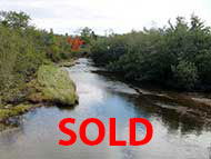 34 acr property with waterfront at River Denys for sale on Cape Breton Island, Nova Scotia, Canada